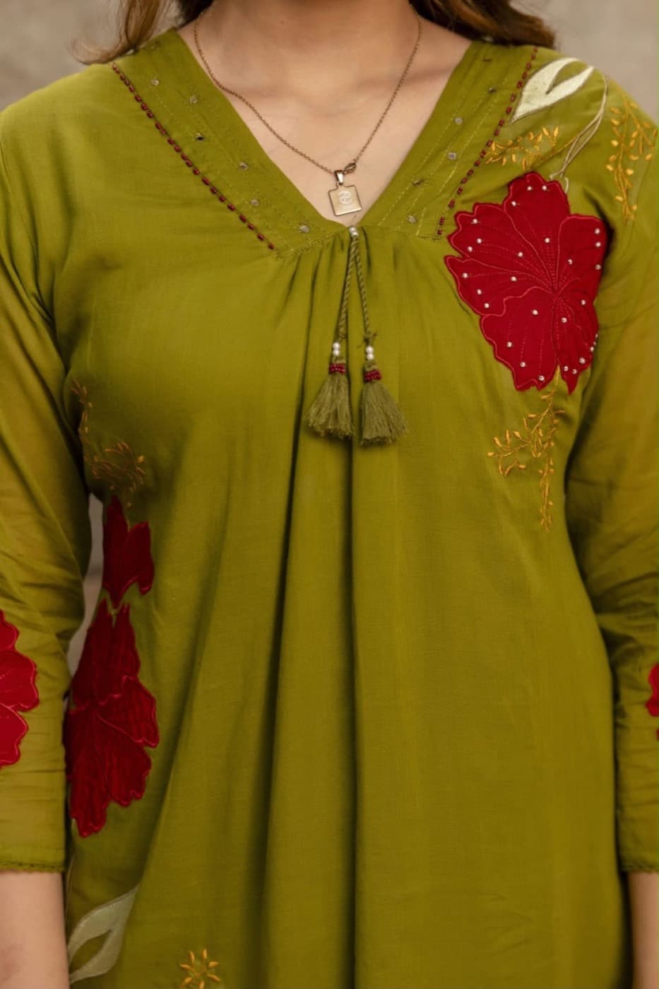Olive cotton floral appliqué detail